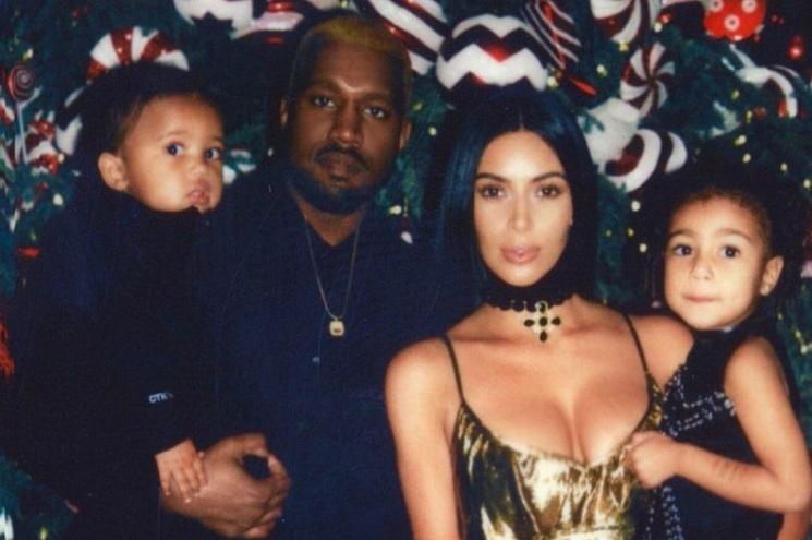 Kanye shuts down divorce rumours once and for all with family Christmas photo with Kim and the kids