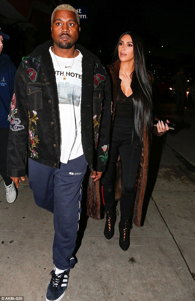 Kim Kardashian wears long fur coat as she steps out for romantic dinner date with husband Kanye West in LA