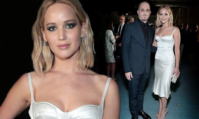 Jennifer Lawrence smolders in white silk while crossing paths with ex Darren Aronofsky at BAM