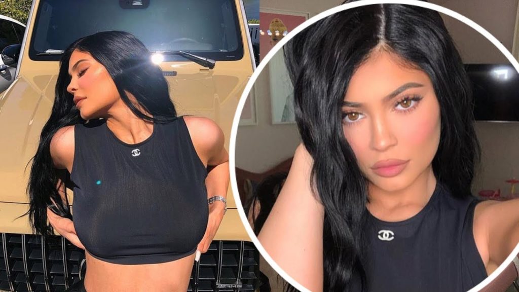 Kylie Jenner wears Chanel crop top as she reclines on her newly repainted beige G-Wagon