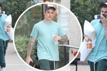 Justin Bieber carries a pillow and some vitamin supplements in LA