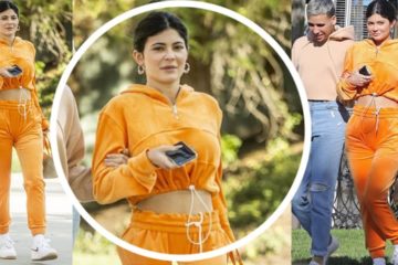 Kylie Jenner flashes her midriff in orange tracksuit as she goes makeup-free for lunch in LA