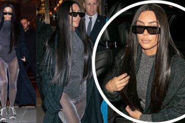 Kim Kardashian in sparkling grey unitard as she heads out for dinner in Paris