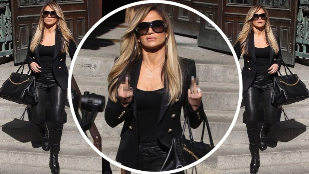 Jennifer Lopez defiantly flips the bird while filming Courthouse Scene on the NYC set of Hustlers