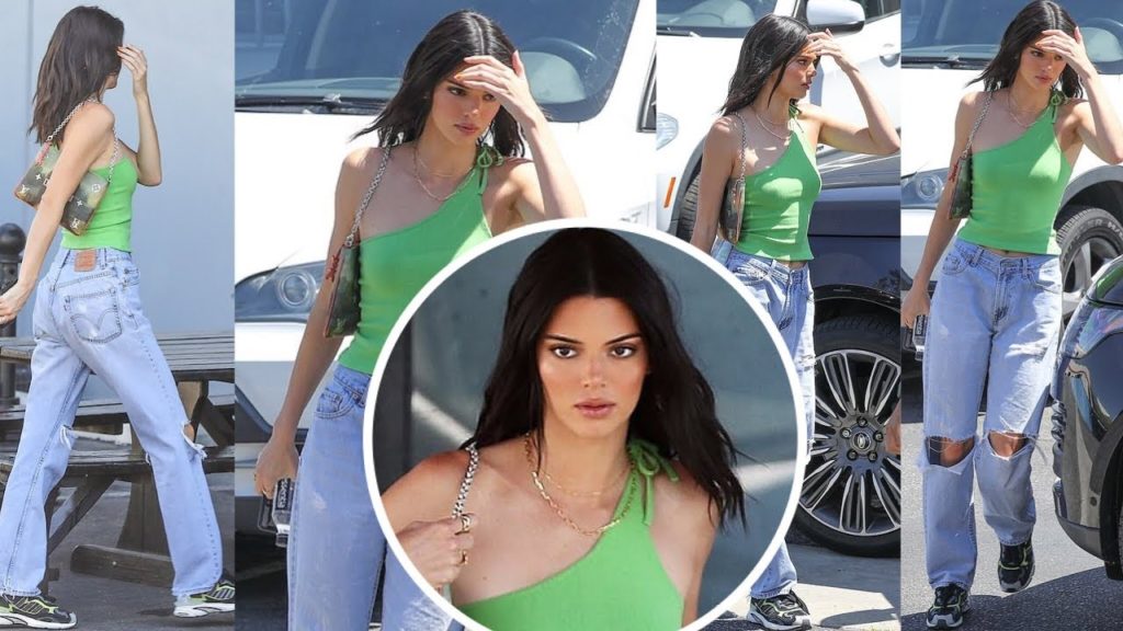 Kendall Jenner in green tank top as carries Mona Lisa purse to meet up with Scott Disick